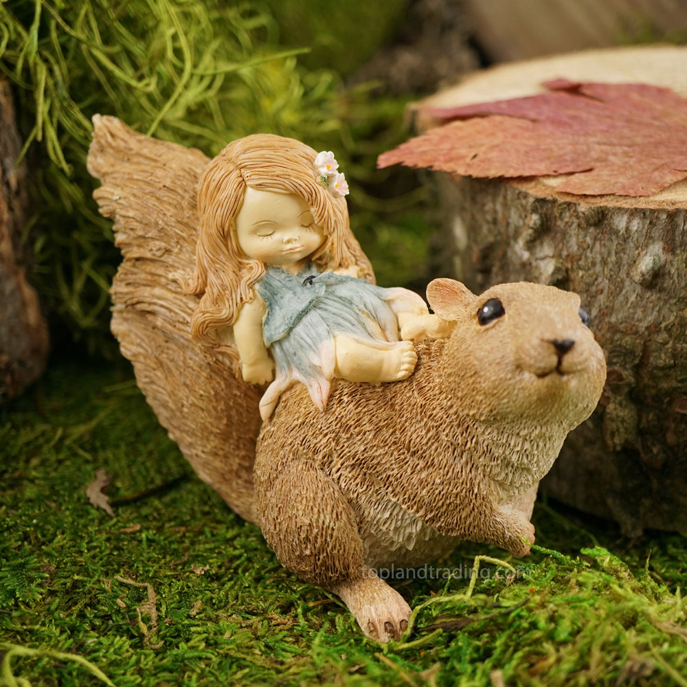 Little Fairy Sleeping On Squirrel Figurine