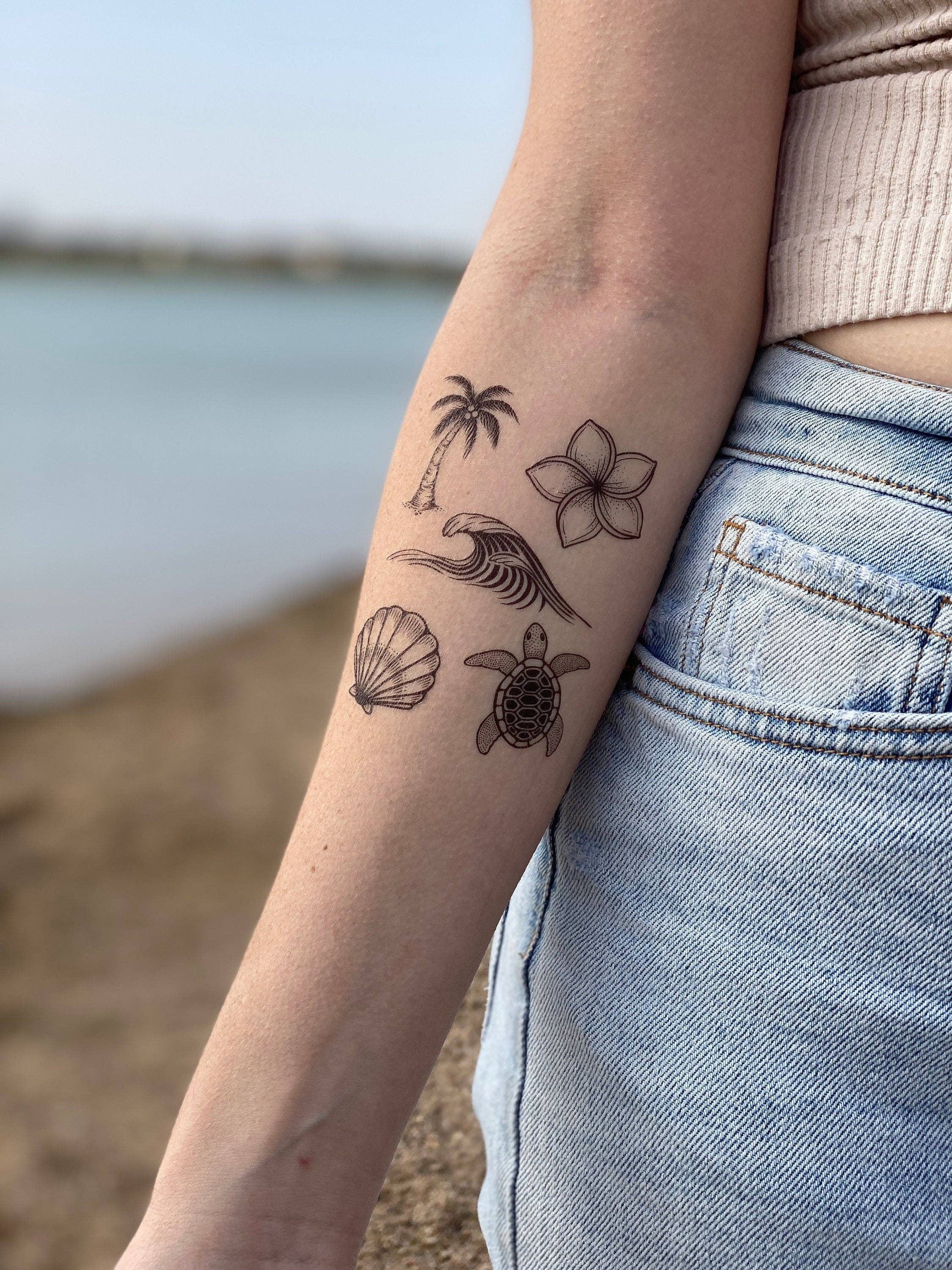 Elegant Turtle and Flower Tattoo with Infinite Waves