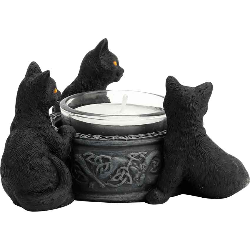 Side view of the Triple Black Cat Tealight Candle Holder showing the height of the piece and the geometric knotwork pattern on the rim of the basin.